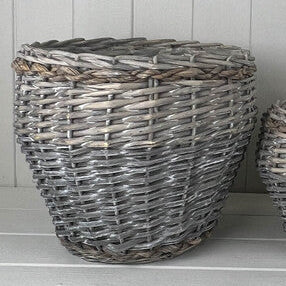 Detail of the Meon basket's grey woven finish and braided rim
