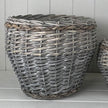 Detail of the Meon basket's grey woven finish and braided rim