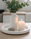 White wood beaded round tray for home decor by Starlight Express, featuring a decorative beaded edge and smooth surface.