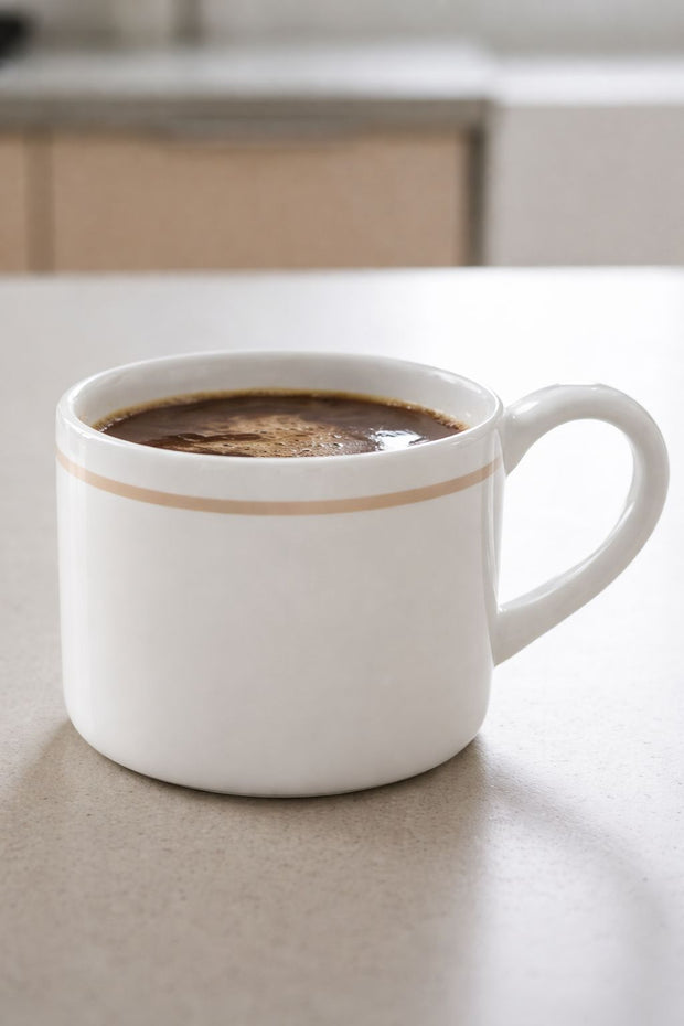 White organic Delilah mug by Coach House, featuring a simple ceramic design perfect for kitchen and dining use.