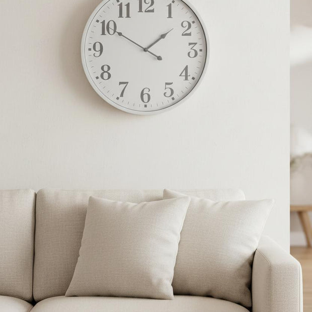 White round Aubrey wall clock by Hill Interiors, featuring a sleek modern design with black hour and minute hands.