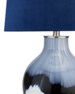 Navy blue glass lamp by Hill Interiors, a stylish lighting fixture with a sleek glass design for modern home decor.