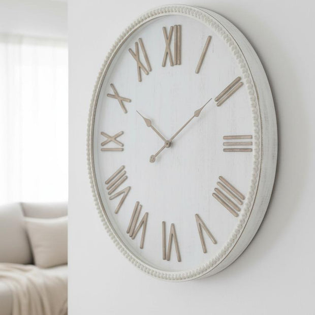 Large rustic white clock with beaded frame from Hill Interiors, featuring a vintage-style design and classic round shape.