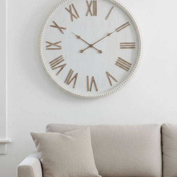 Large rustic white clock with beaded frame, decorative wall clock by Hill Interiors, featuring vintage-inspired design.
