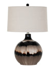 Chocolate brown glass lamp from Hill Interiors, showcasing a stylish lighting fixture with a smooth glass finish and modern design.