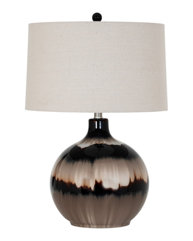 Chocolate brown glass lamp from Hill Interiors, showcasing a stylish lighting fixture with a smooth glass finish and modern design.
