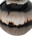 Chocolate brown glass lamp from Hill Interiors, showcasing a sleek lighting fixture with a smooth glass finish.