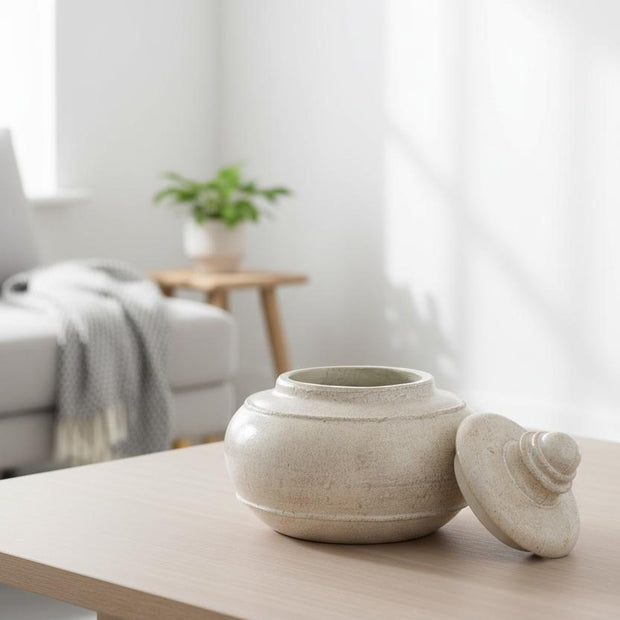 Tarn Neutral Glazed Lidded Pot vase with a smooth, rounded design and neutral glaze finish, by Hill Interiors.