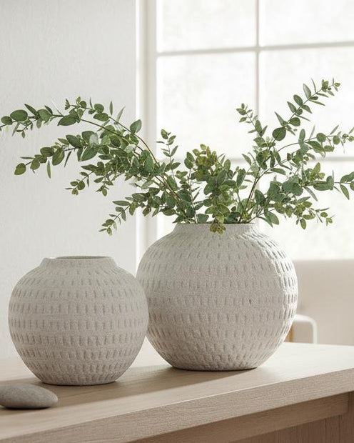 Ashen white matte round vase from Hill Interiors, showcasing smooth ceramic surface and modern design.
