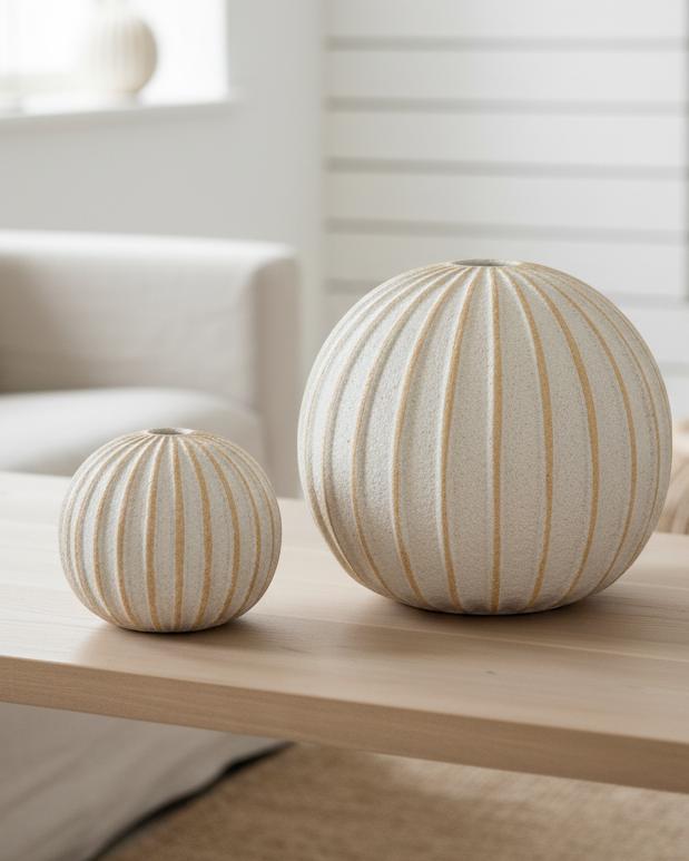Decorative globe striped ball for home décor by Hill Interiors, featuring colorful, textured design for stylish interior accents.