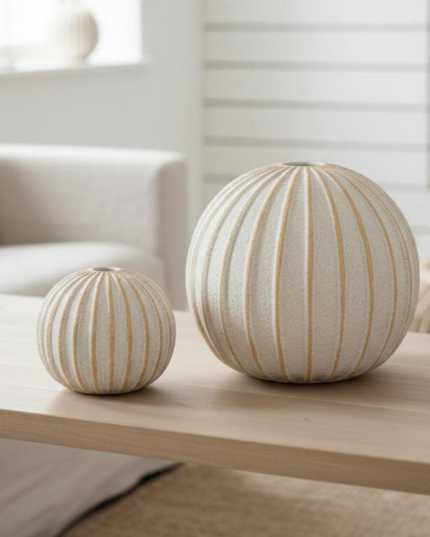 Decorative striped globe ball for home décor by Hill Interiors, showcasing a stylish, colorful accent piece for interior design.
