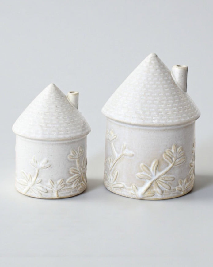 White Ceramic House With Flower Detailing