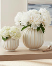 Decorative vase with blue and white globe striped design by Hill Interiors, perfect for home décor accents.