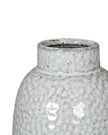 White glazed Cairn Dimple vase by Hill Interiors, showcasing a smooth, rounded ceramic design with a textured dimpled surface.