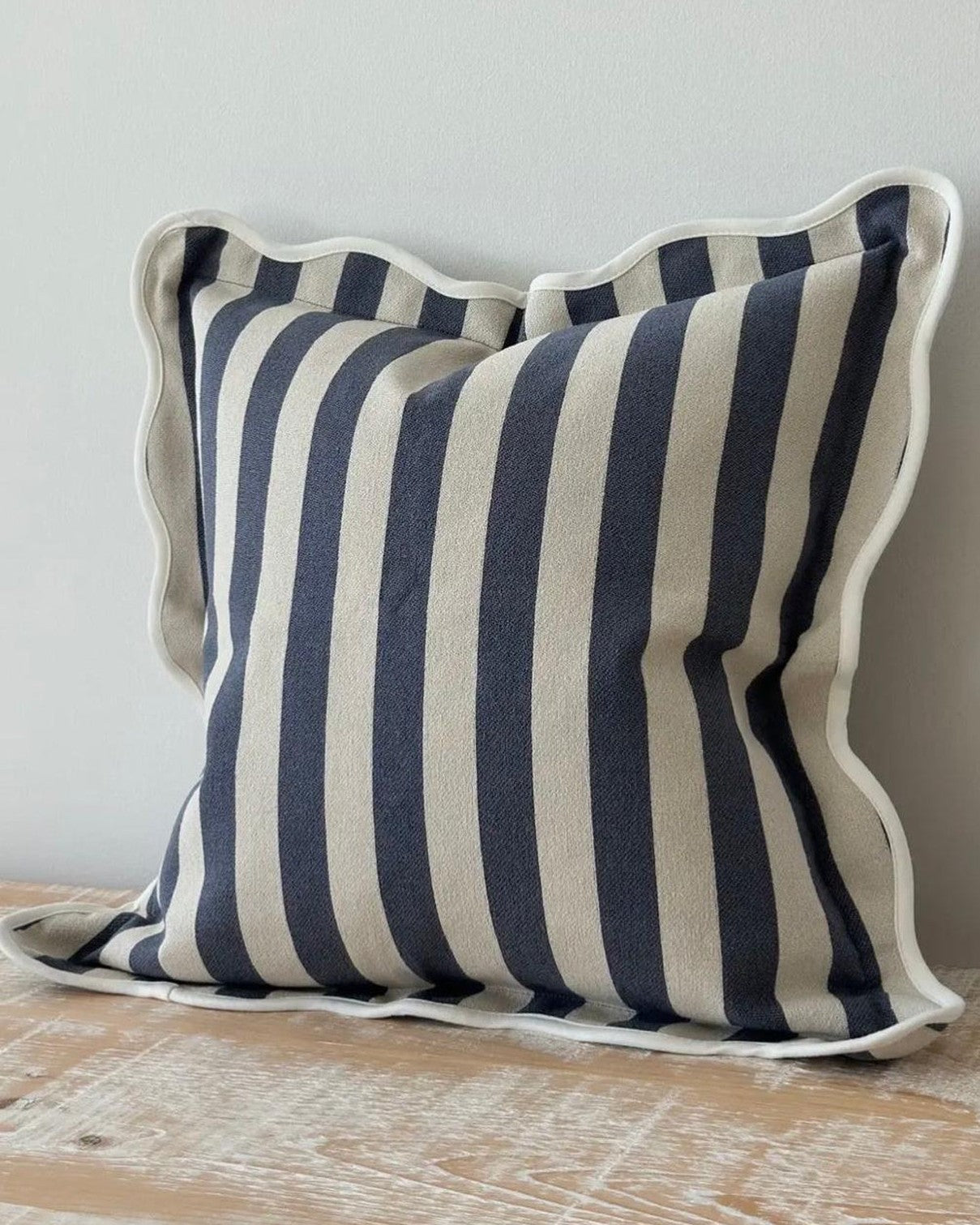 Navy blue Chloe square scalloped cushion cover by Ellenvale Trade, soft furnishings with elegant scalloped edges on fabric.
