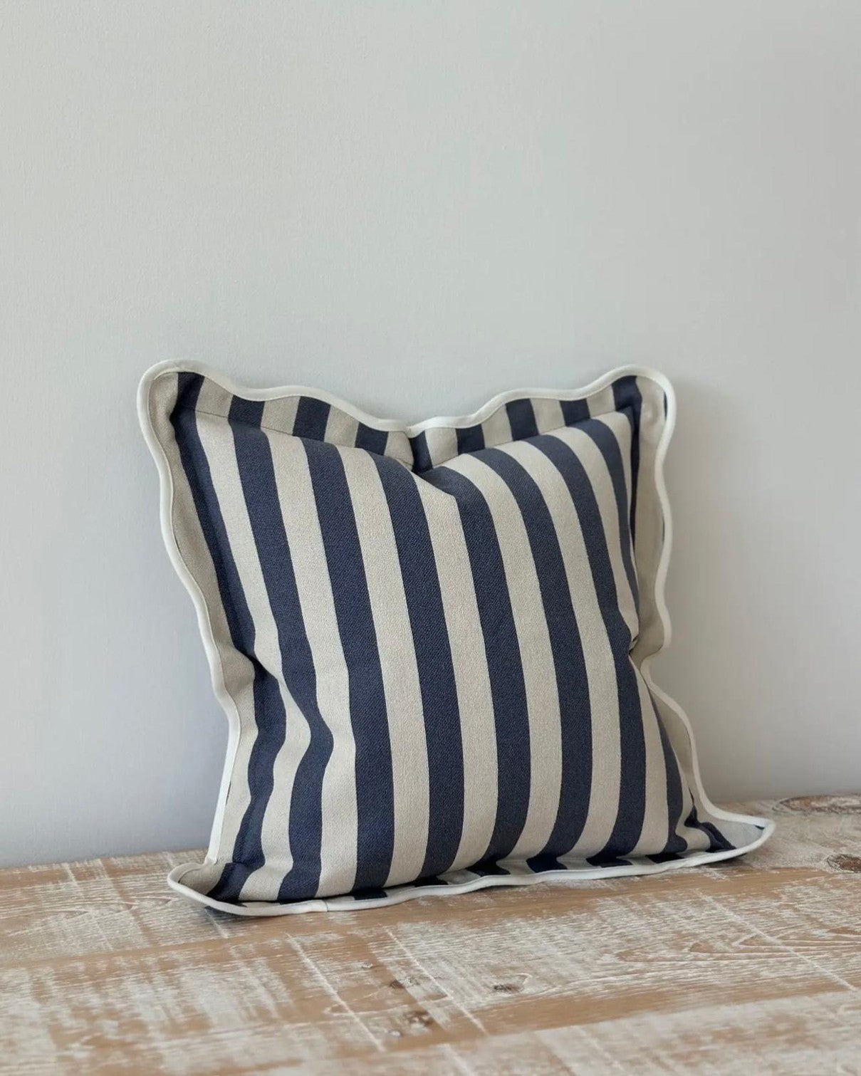 Navy blue square scalloped cushion cover by Ellenvale Trade, featuring soft furnishings with decorative scalloped edges.
