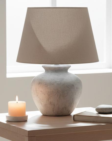 Darcy natural stone round lamp by Hill Interiors, showcasing a smooth, circular stone lamp suitable for modern lighting decor.