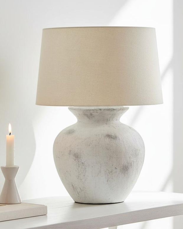 Extra large stone bath lamp by Hill Interiors, showcasing a modern lighting fixture with a textured stone finish.