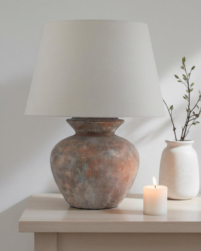 Large brown round table lamp with linen shade, perfect for home decor by Hill Interiors.