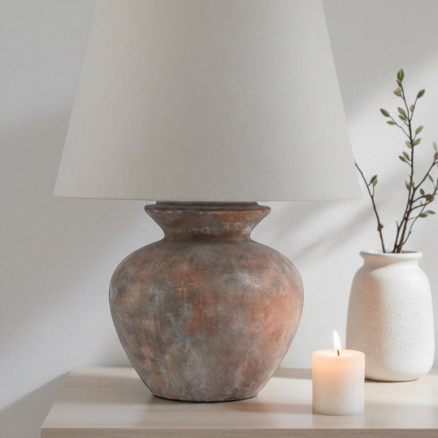 Large brown round table lamp with linen shade, perfect for home decor by Hill Interiors.