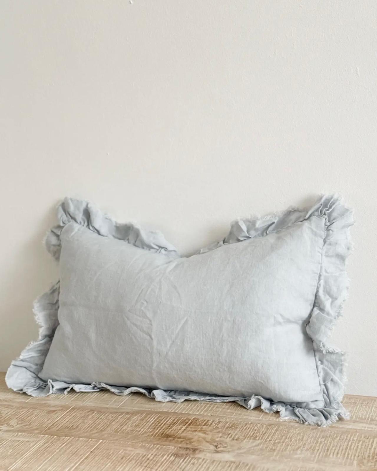 Ocean blue rectangular cotton cushion cover with soft, textured fabric from Ellenvale Trade, perfect for stylish home decor.
