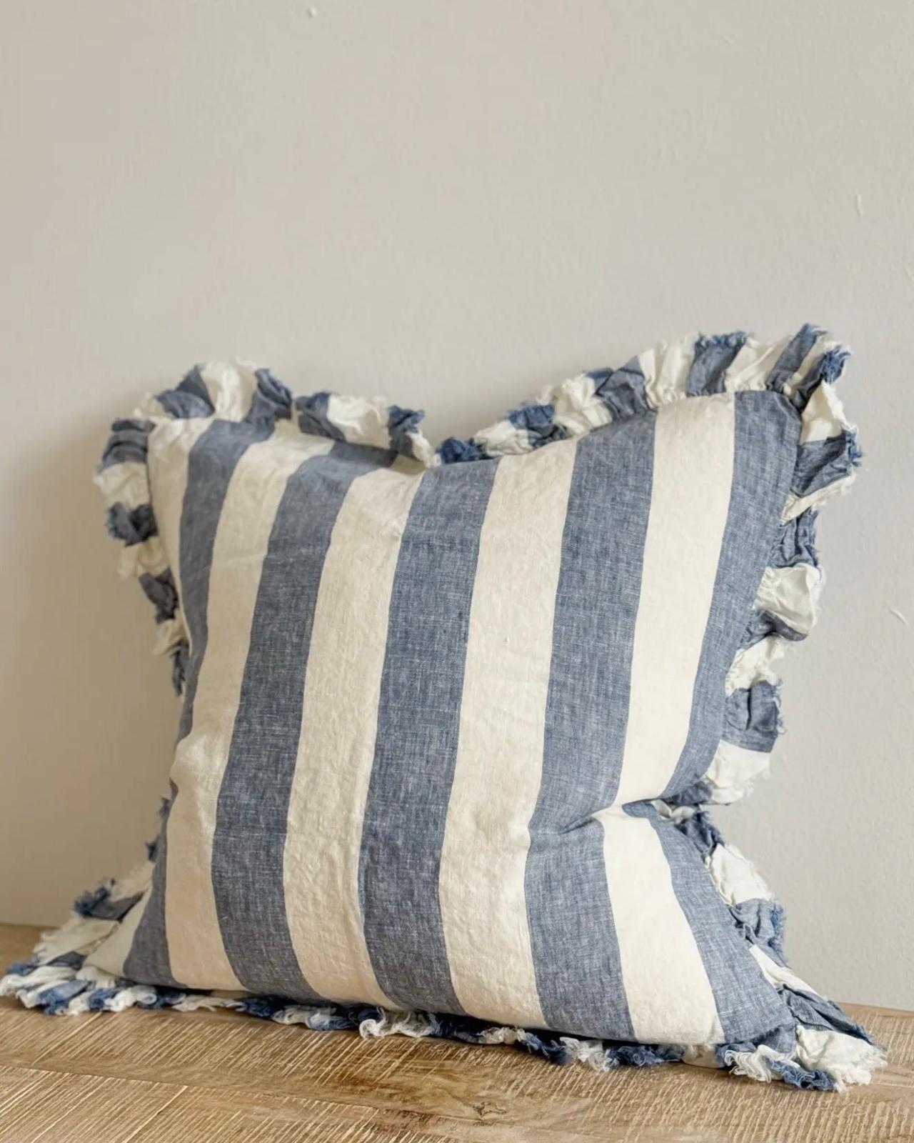 Blue and white striped cotton blend cushion cover from Ellenvale Trade, featuring luxury soft furnishings for stylish home decor.