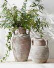 Siena Matt Brown Stone Amphora Vase by Hill Interiors, showcasing a classic, textured ceramic vase with a narrow neck and rounded body.