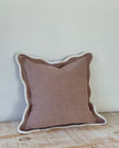 Dusty pink Chloe square scalloped cushion cover by Ellenvale Trade, soft furnishings with scalloped edges on a cushion.