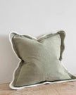 Chloe extra large sage green square cushion cover with scalloped edges, soft furnishings by Ellenvale Trade, shown on a sofa.
