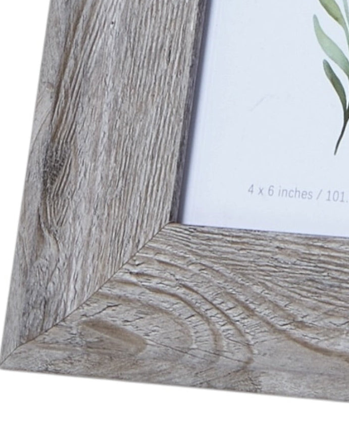 Neutral wooden photo frame with a wide border, showcasing a classic design by Hill Interiors perfect for home decor.