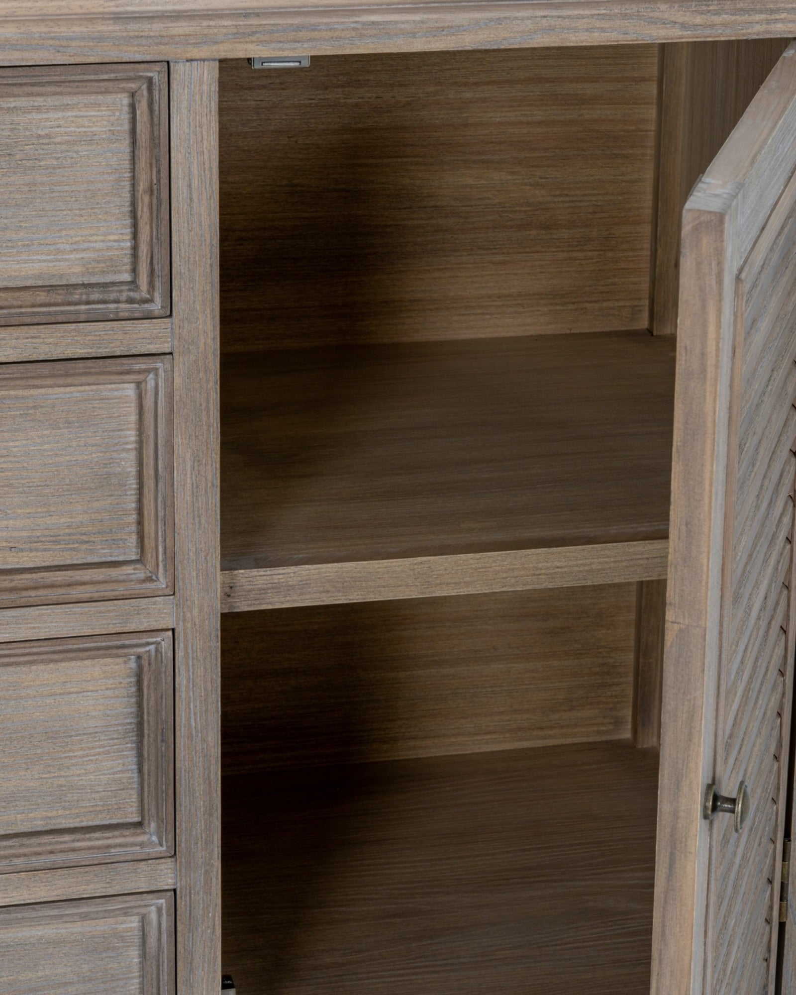 Large Delphine Collection 2-door, 4-drawer dresser base by Hill Interiors, showcasing a stylish furniture piece with a smooth finish.