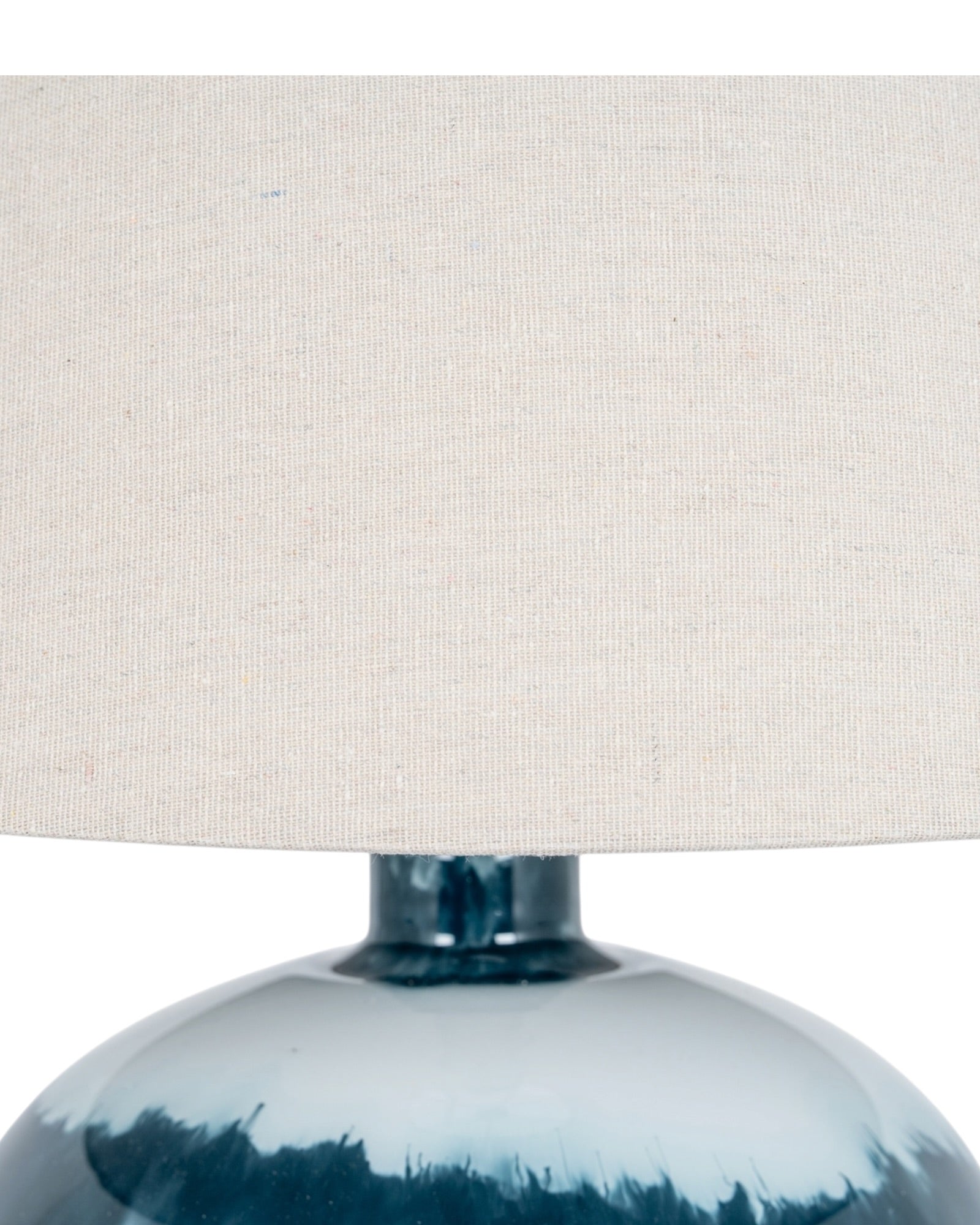 Teal blue glass lamp by Hill Interiors, decorative lighting fixture with a smooth, rounded glass shade on a sleek base.