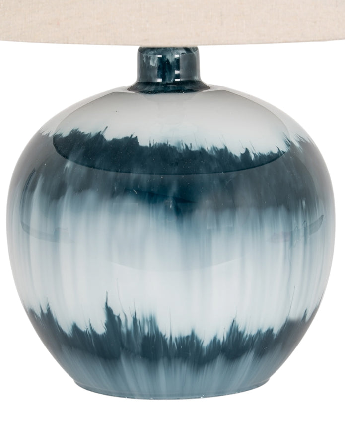 Teal blue glass lamp from Hill Interiors with a sleek, modern lighting design and a smooth glass finish.