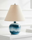Teal blue glass lamp from Hill Interiors with a sleek lighting design and smooth glass surface.