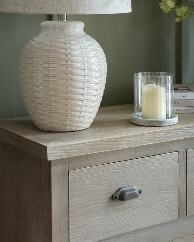 Haldon Collection 12-drawer chest by Hill Interiors showing a wooden furniture piece with silver handles and ample storage drawers.