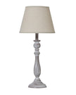 Dunum column table lamp with linen shade by Hill Interiors, featuring a sleek design and soft fabric lampshade for cozy lighting.