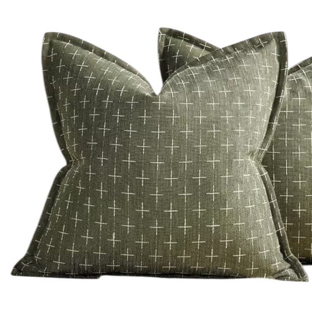 Olive green woven cushion cover with cross design from Starlight Express, soft furnishings accent for sofa or bed.