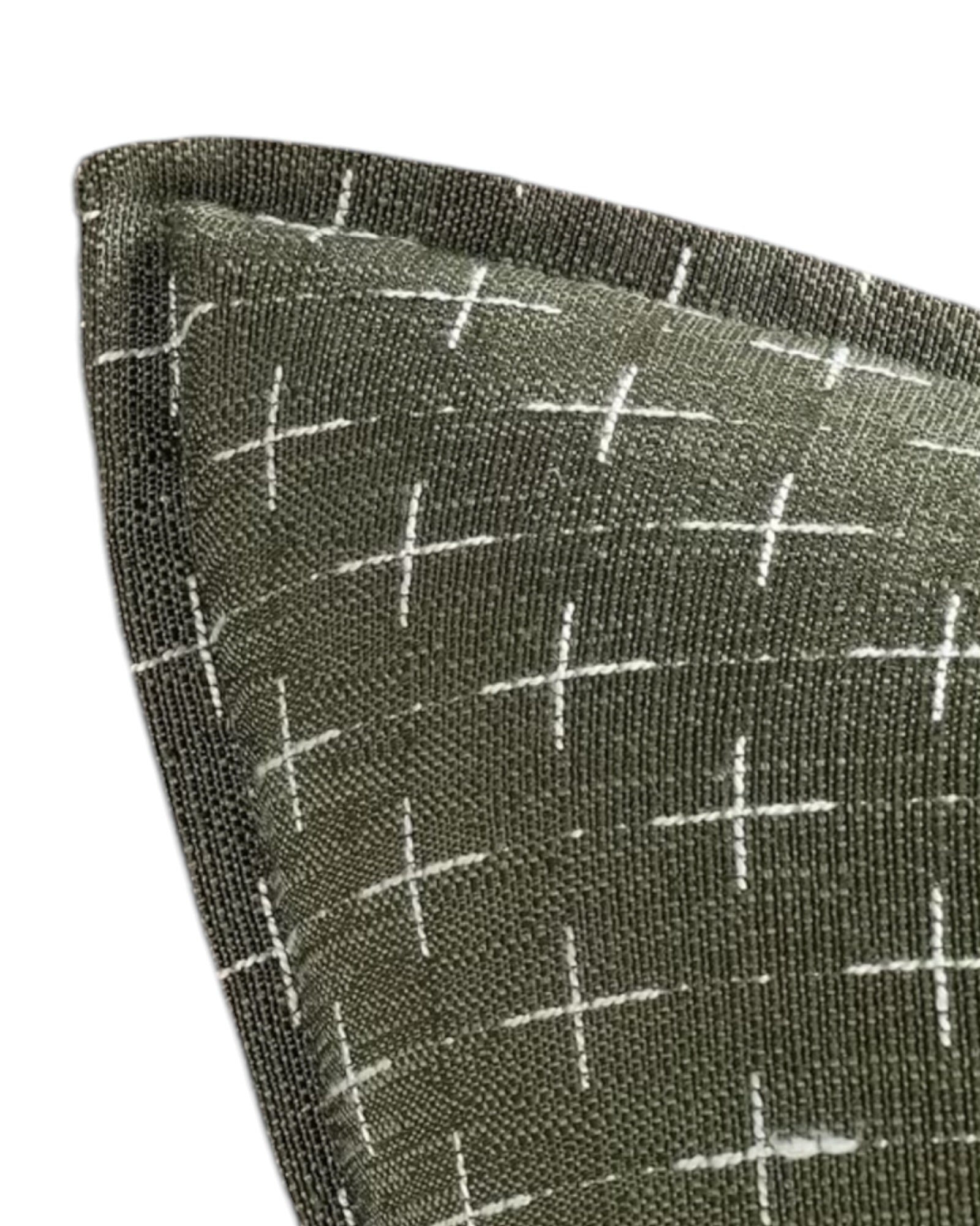 Olive green woven cushion cover with cross design, soft furnishings by Starlight Express, showcasing textured fabric and decorative pattern.