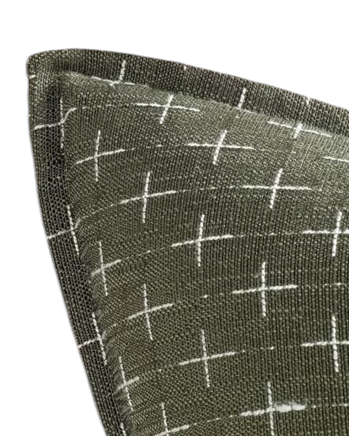 Olive green woven cushion cover with cross design, soft furnishings by Starlight Express, showcasing textured fabric and decorative pattern.