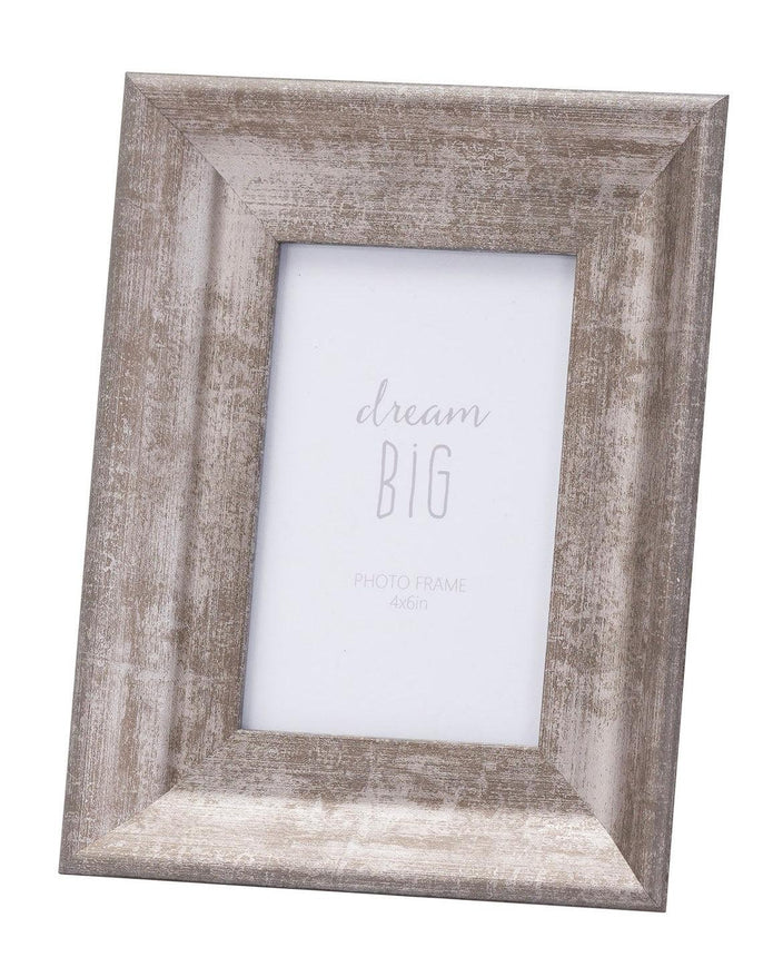 Silver wooden photo frame with a wide border, decorative design, perfect for displaying photos in a stylish setting.