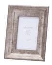 Silver wooden photo frame with a wide border, decorative design, perfect for displaying photos in a stylish setting.