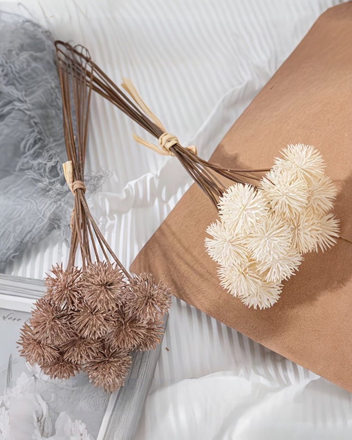 Artificial brown pom pom bunch from Starlight Express, featuring fluffy, round faux plant decorations for home or craft decor.