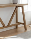 Haldon Collection wooden console table by Hill Interiors, featuring a sleek design and smooth finish for modern living spaces.