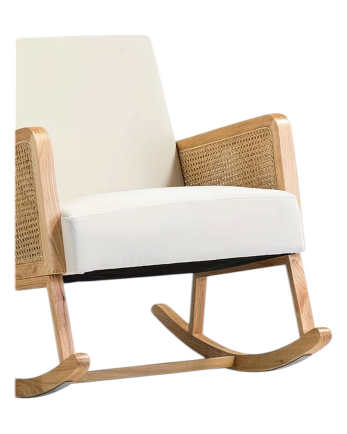 Cream rattan rocking chair from Starlight Express, showcasing a stylish, comfortable furniture piece with curved armrests and a smooth rocking motion.