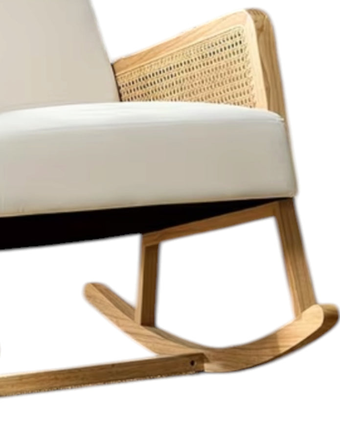 Cream rattan rocking chair from Starlight Express with a smooth curved design and sturdy wooden base.