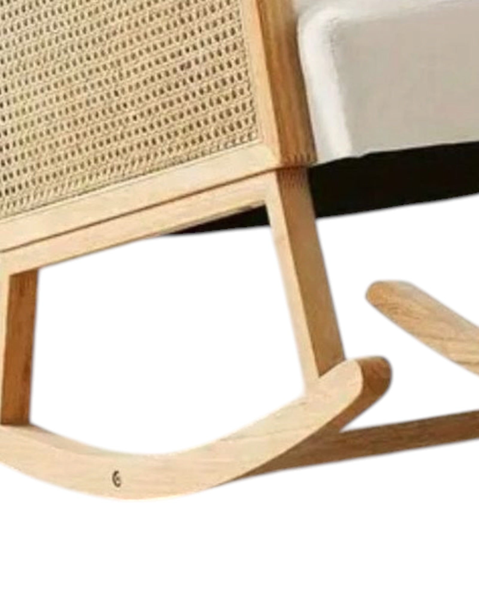Cream rattan rocking chair from Starlight Express with a rounded back and armrests, perfect for cozy living spaces.