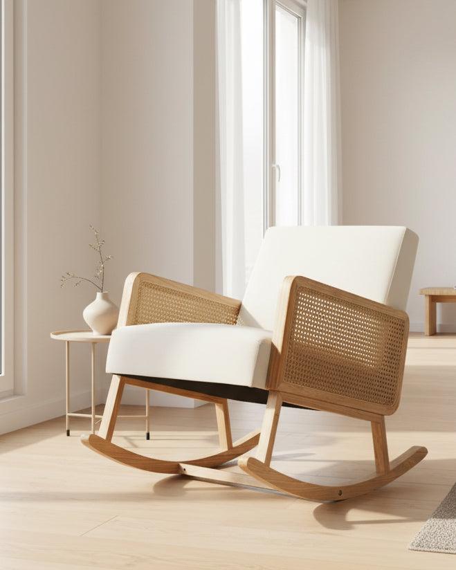 Cream rattan rocking chair from Starlight Express, showcasing a cozy, stylish furniture piece with curved armrests and a sturdy base.