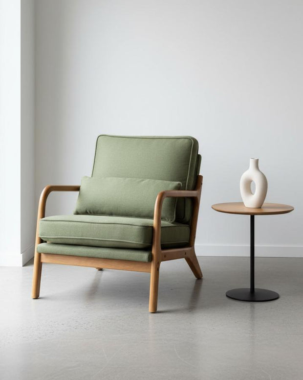 Green retro wooden framed arm chair by Starlight Express with plush cushioning and vintage design, suitable for living rooms or reading nooks.