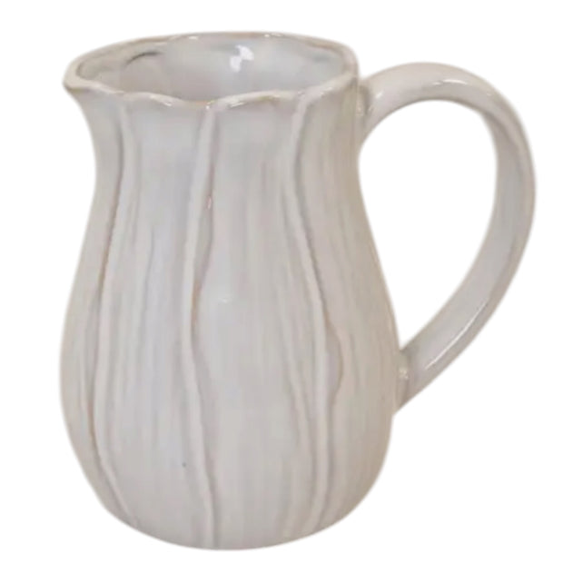 Natural ceramic jug with petal-shaped design, ideal for home decor, by Satchville, featuring a smooth, elegant finish.