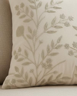 Cream floral embroidered cushion cover from Starlight Express, featuring soft furnishings with intricate floral embroidery.